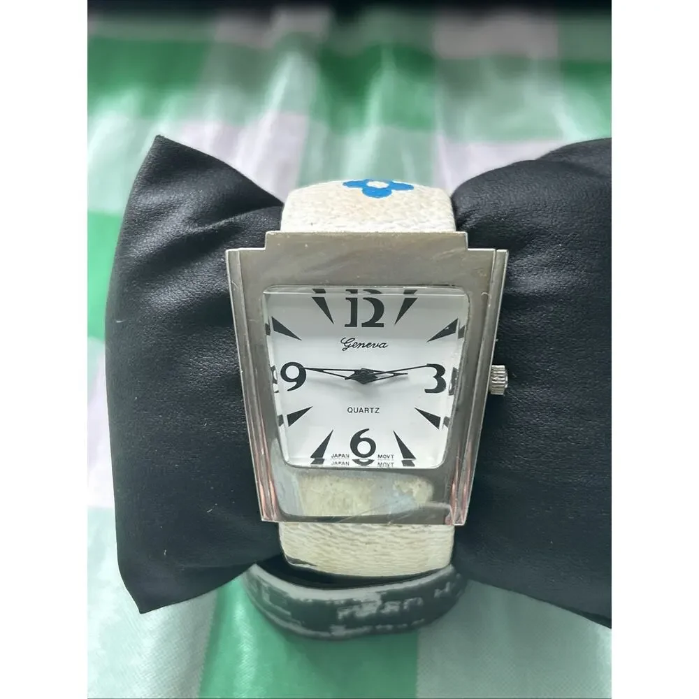 Geneva Silver Tone Multicolored Band Women’s Cuff Watch
